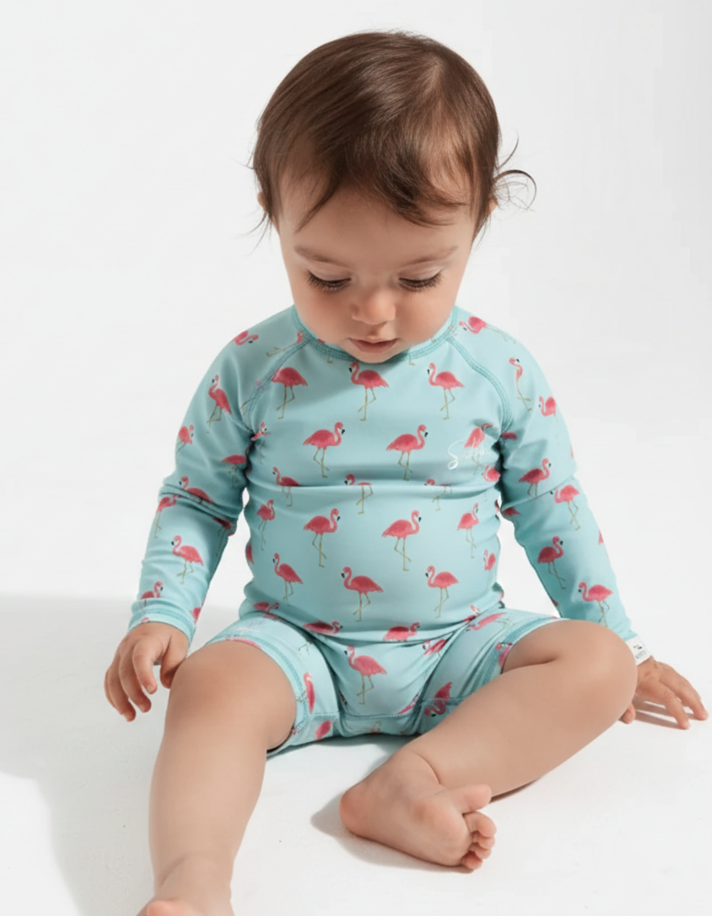 Pink Flamingo Baby Swimsuit, print detail. Sustainable baby swimwear.