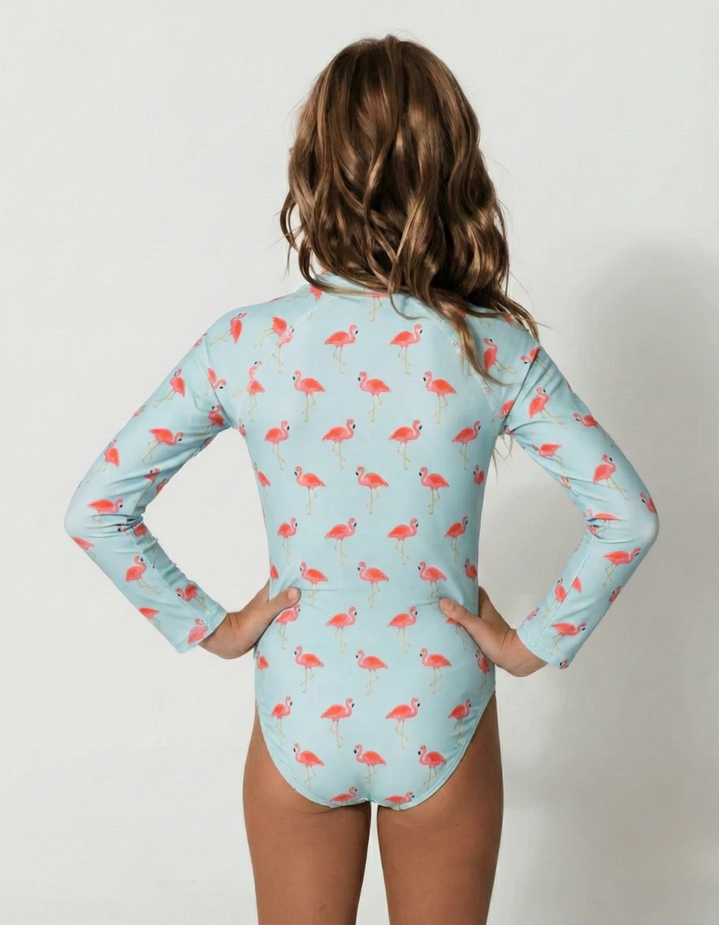 Pink Flamingo Long Sleeved Girls Swimsuit, back view. Sustainable girls swimwear.
