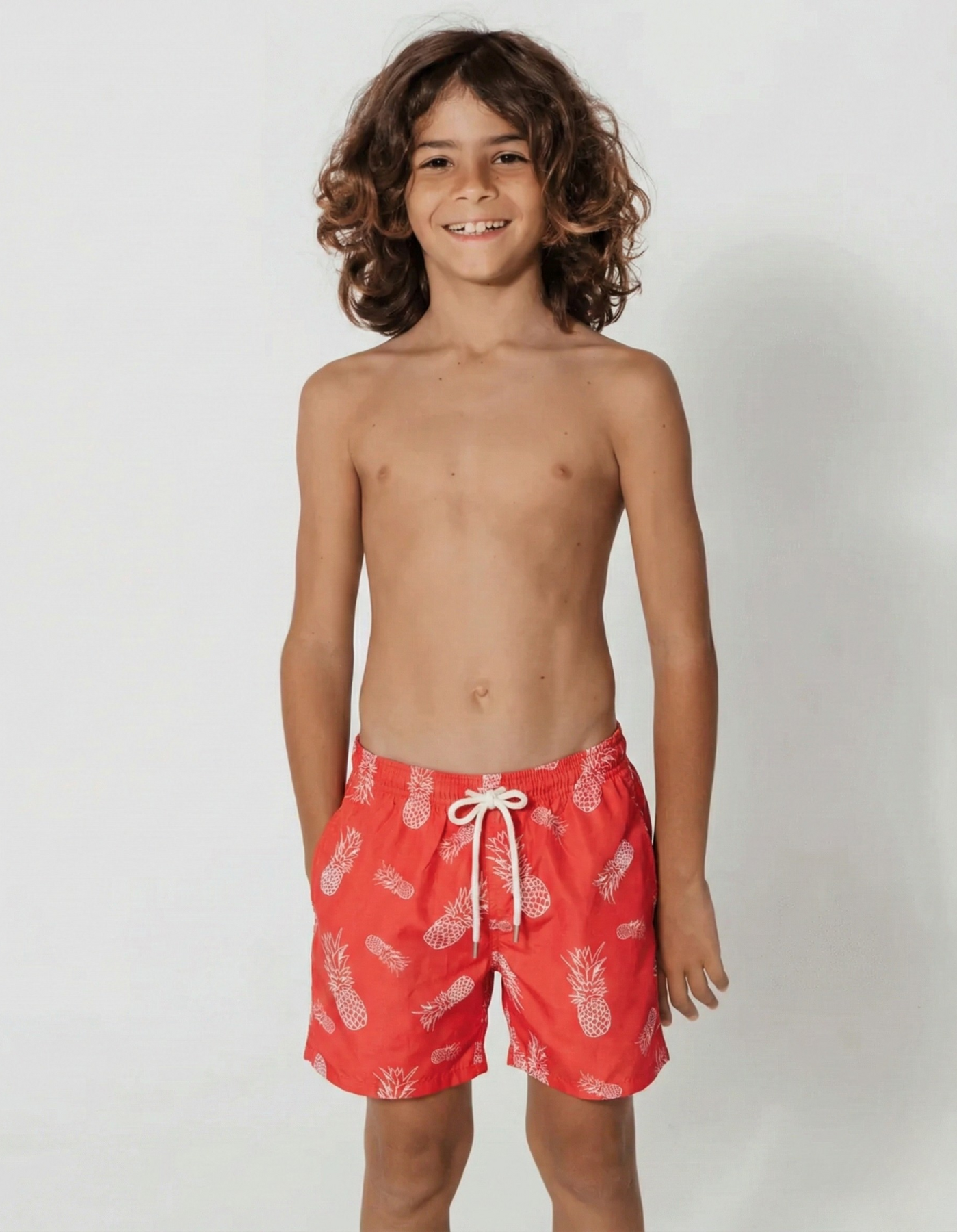 Embroidered Pineapple Boys Swim Shorts, front view. Embroidered kids swim shorts.