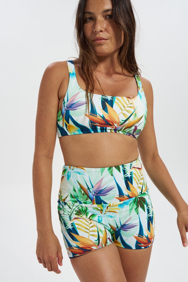 Bird of Paradise / Navy Womens Reversible Swim Shorts, front view. Sustainable womens swimwear.