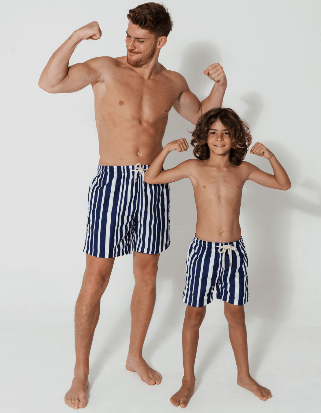 Blue & White Striped Boys Swim Shorts, print detail. Sustainable boys swimwear.