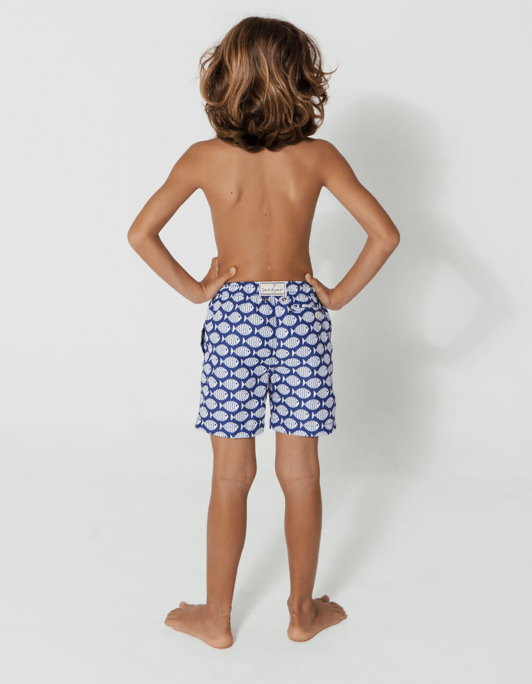 Blue Fish Boys Swim Shorts, back view. Sustainable boys swimwear.