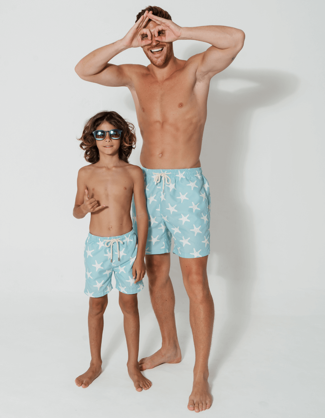 Blue Starfish Boys Swim Shorts, print detail. Sustainable boys swimwear.
