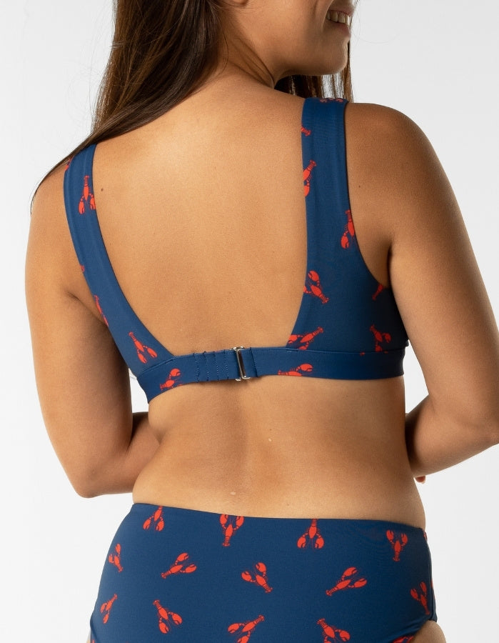 Dune – Royal Red Lobster Womens Plunge Bikini Top, back view. Sustainable womens swimwear.