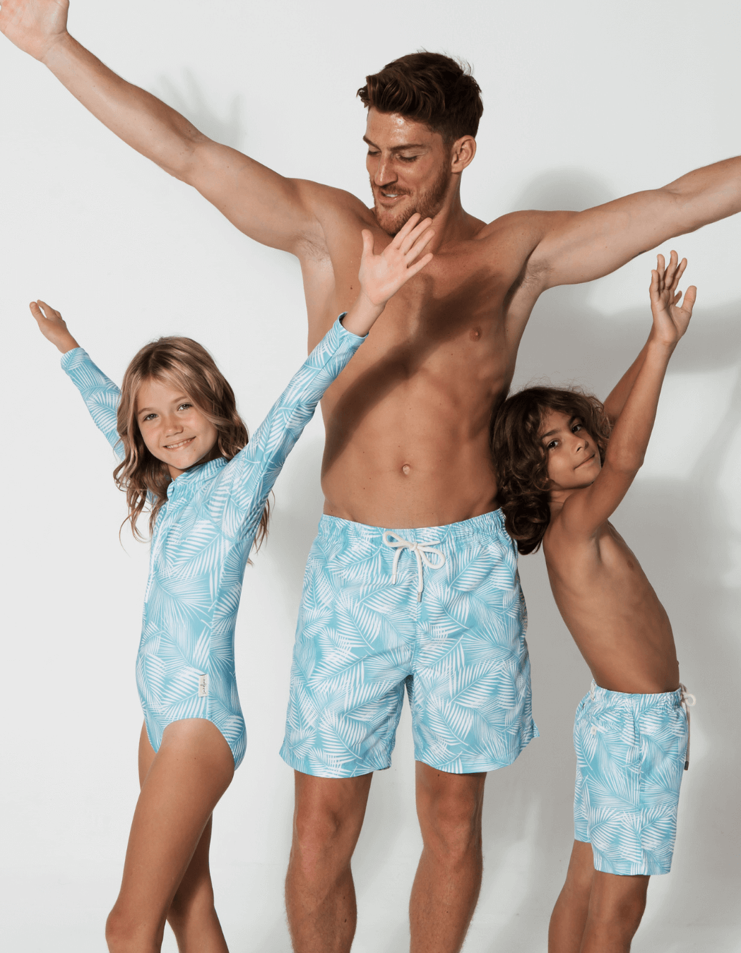 Green Fern Boys Swim Shorts, print detail. Sustainable boys swimwear.