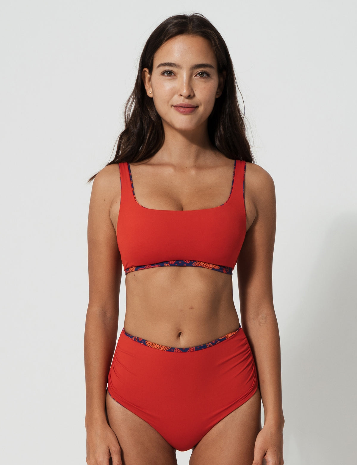 High Waist Red Starfish Womens Bikini Bottoms, lifestyle shot. Sustainable womens swimwear.