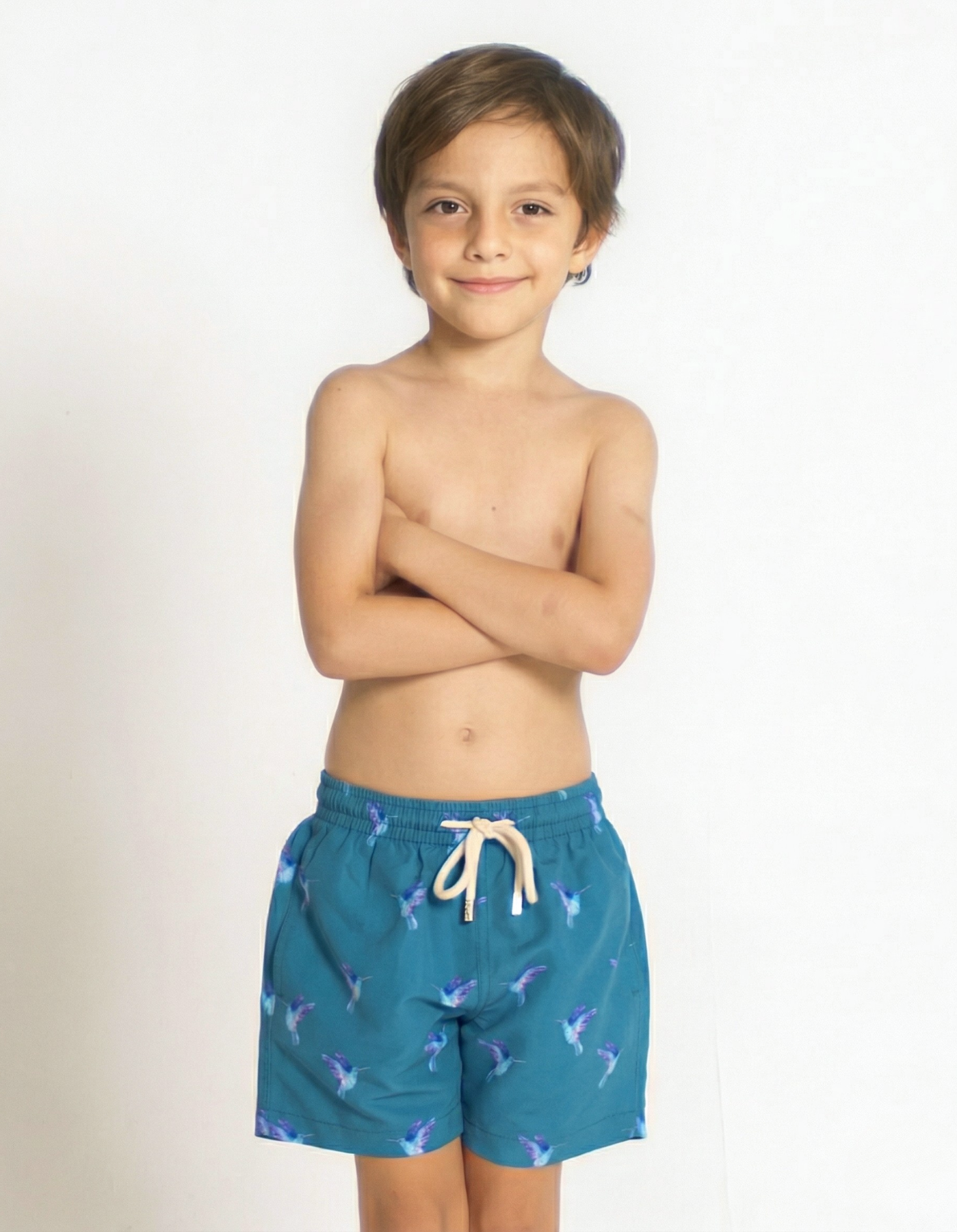 Hummingbird Boys Swim Shorts, front view. Sustainable boys swimwear.