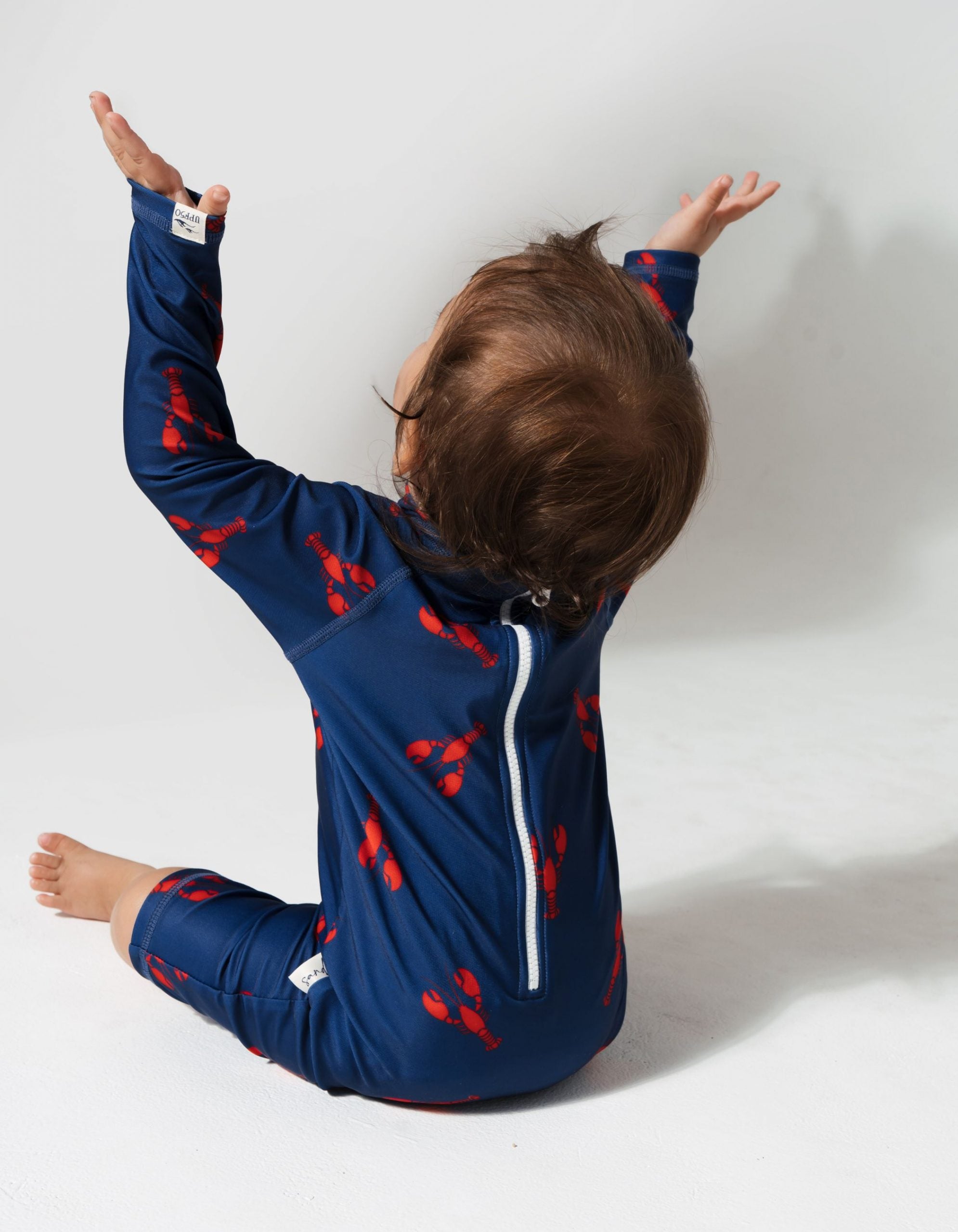 Lobster Baby Swimsuit, print detail. Sustainable baby swimwear.