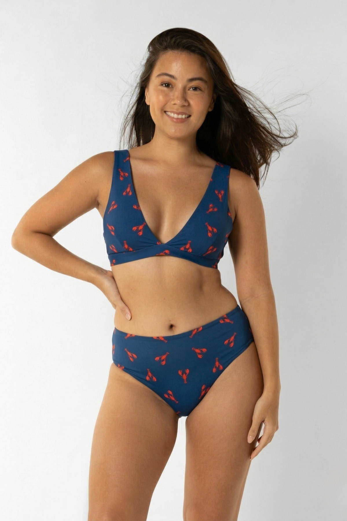 Dune – Royal Red Lobster Womens Plunge Bikini Top, print detail. Sustainable womens swimwear.