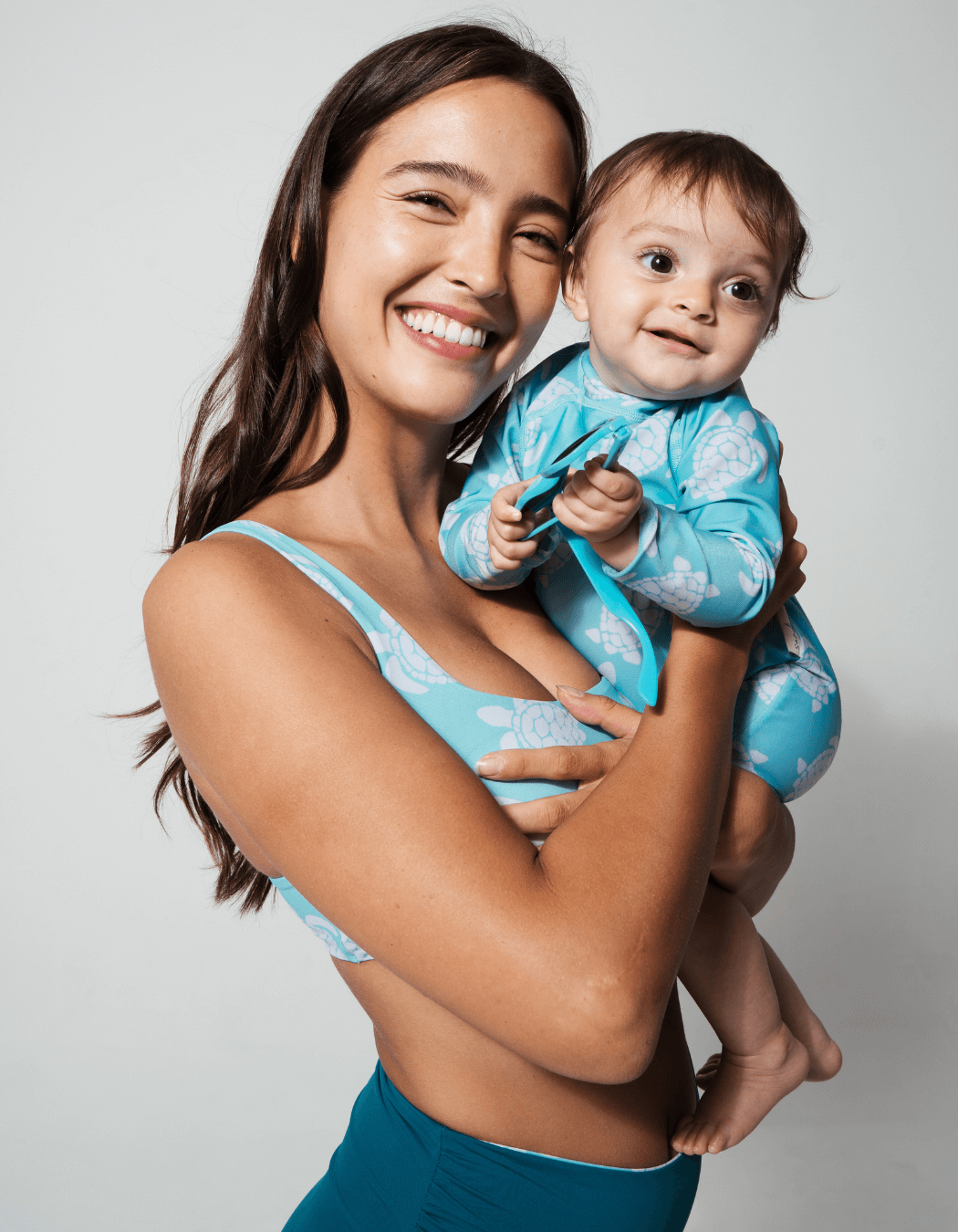Maldives Blue Turtle Baby Swimsuit, print detail. Sustainable baby swimwear.