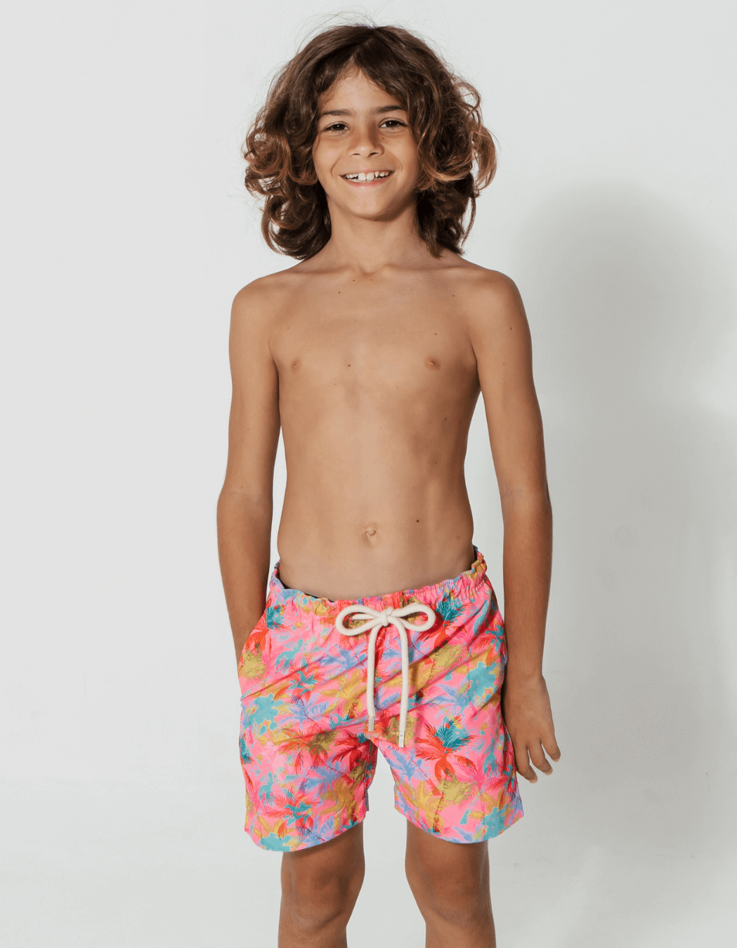 Pink Palm Boys Swim Shorts, print detail. Sustainable boys swimwear.