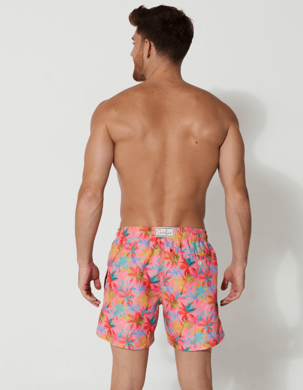 Pink Palm Mens Swim Shorts, print detail. Sustainable mens swimwear.