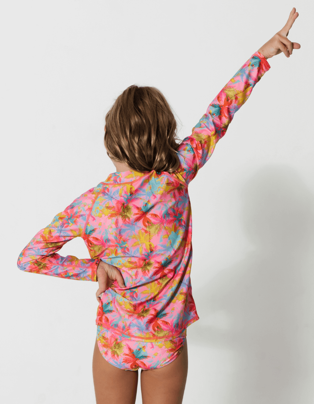 Pink Palm Rash Guard, back view. Kids UPF50 rash guard.