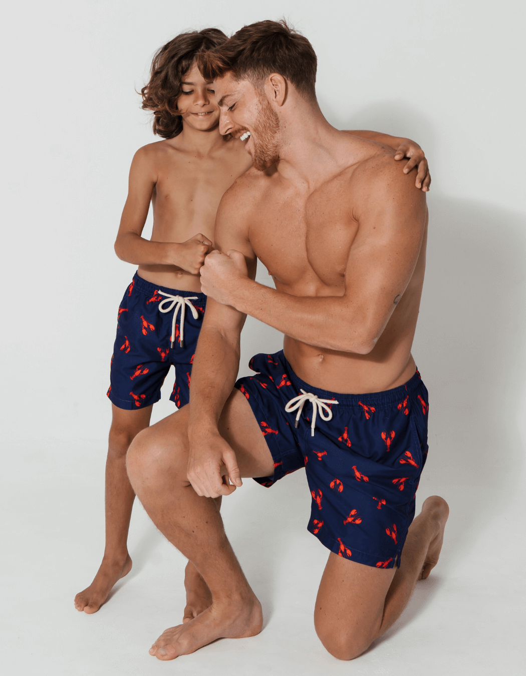 Printed Red Lobster Boys Swim Shorts, print detail. Sustainable boys swimwear.