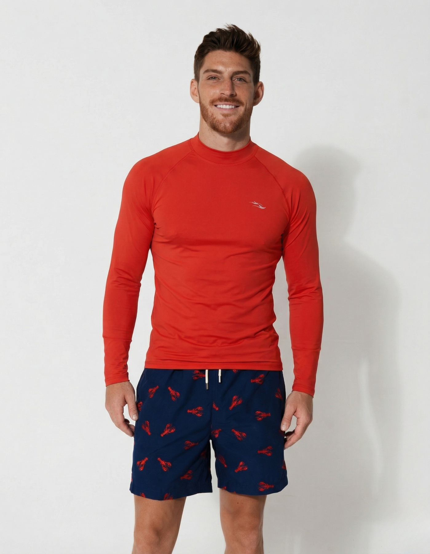 Red Long Sleeved Mens Rash Guard, front view. Mens UPF50 rash guard.