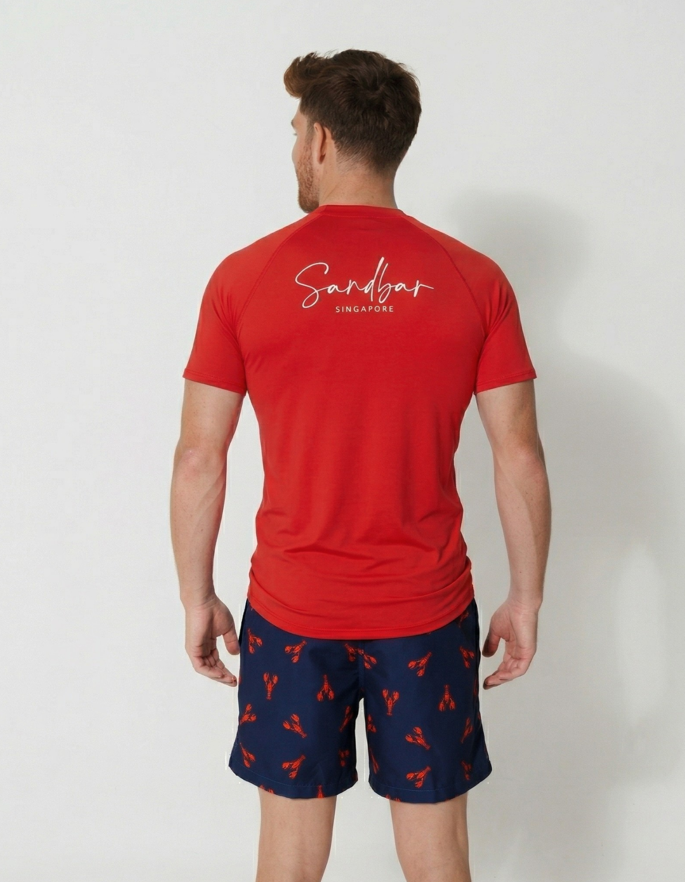 Red Short Sleeved Mens Rash Guard, back view. Mens UPF50 rash guard.
