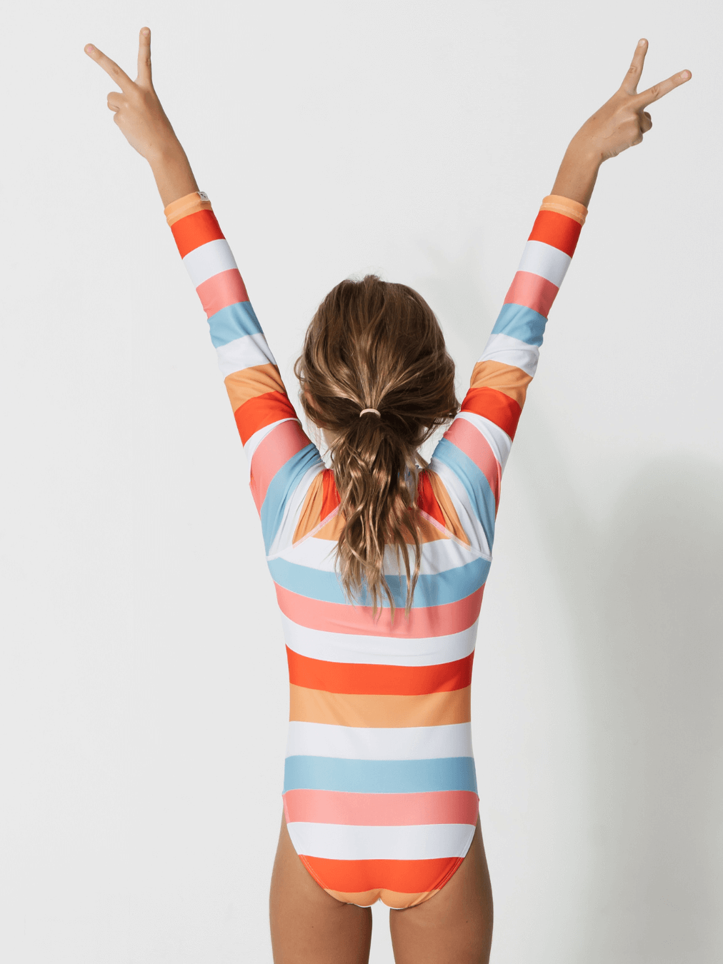 Sandbar_swimwear_long_sleeved_swim_sunset_stripes
