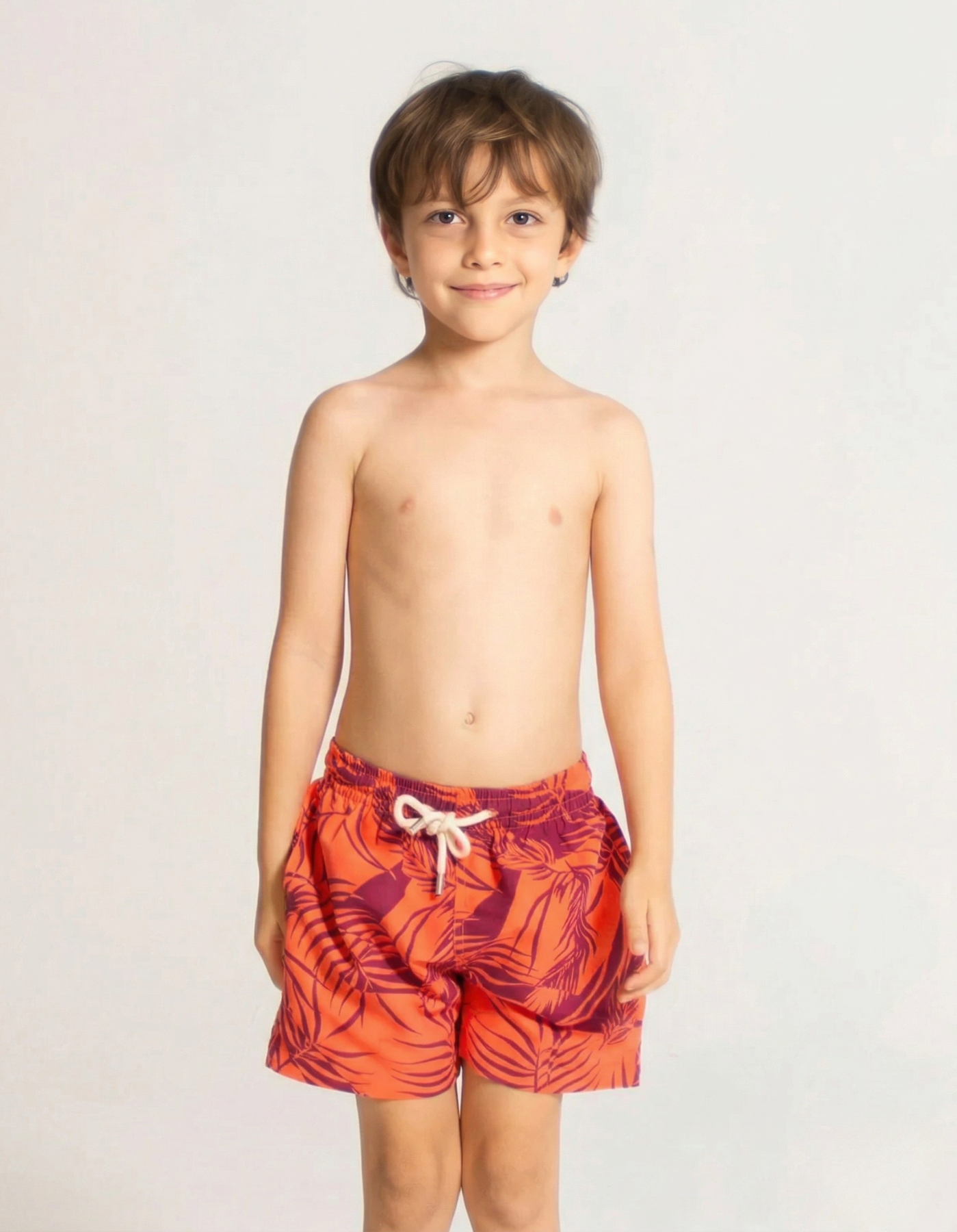 Sunset Palm Boys Swim Shorts, front view. Sustainable boys swimwear.