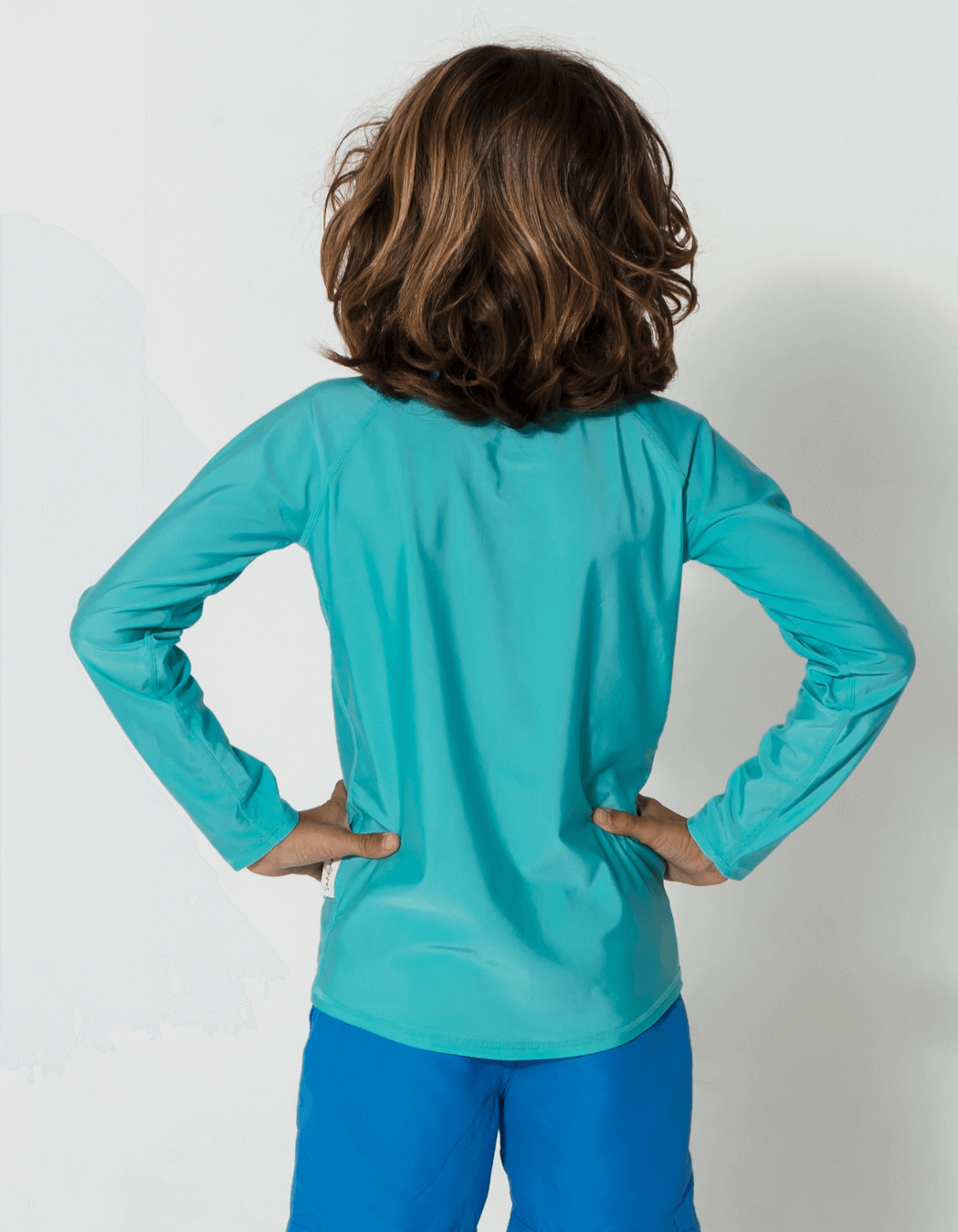 Turquoise Rash Guard, back view. Kids UPF50 rash guard.