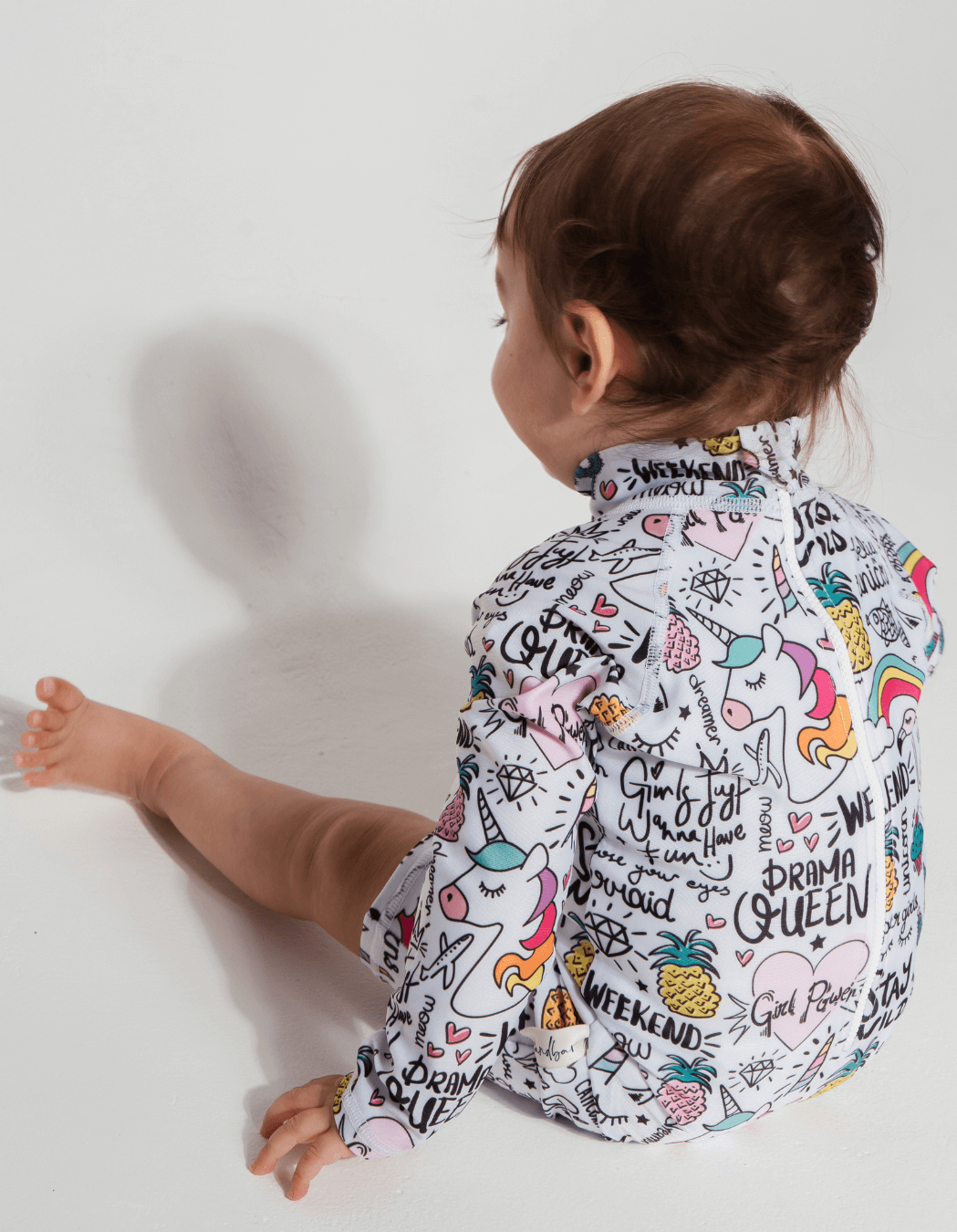 Unicorn & Flamingo Baby Swimsuit, back view. Sustainable baby swimwear.