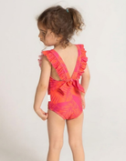 Aperol Palm Girls Ruffle Swimsuit, back view. Sustainable girls swimwear.