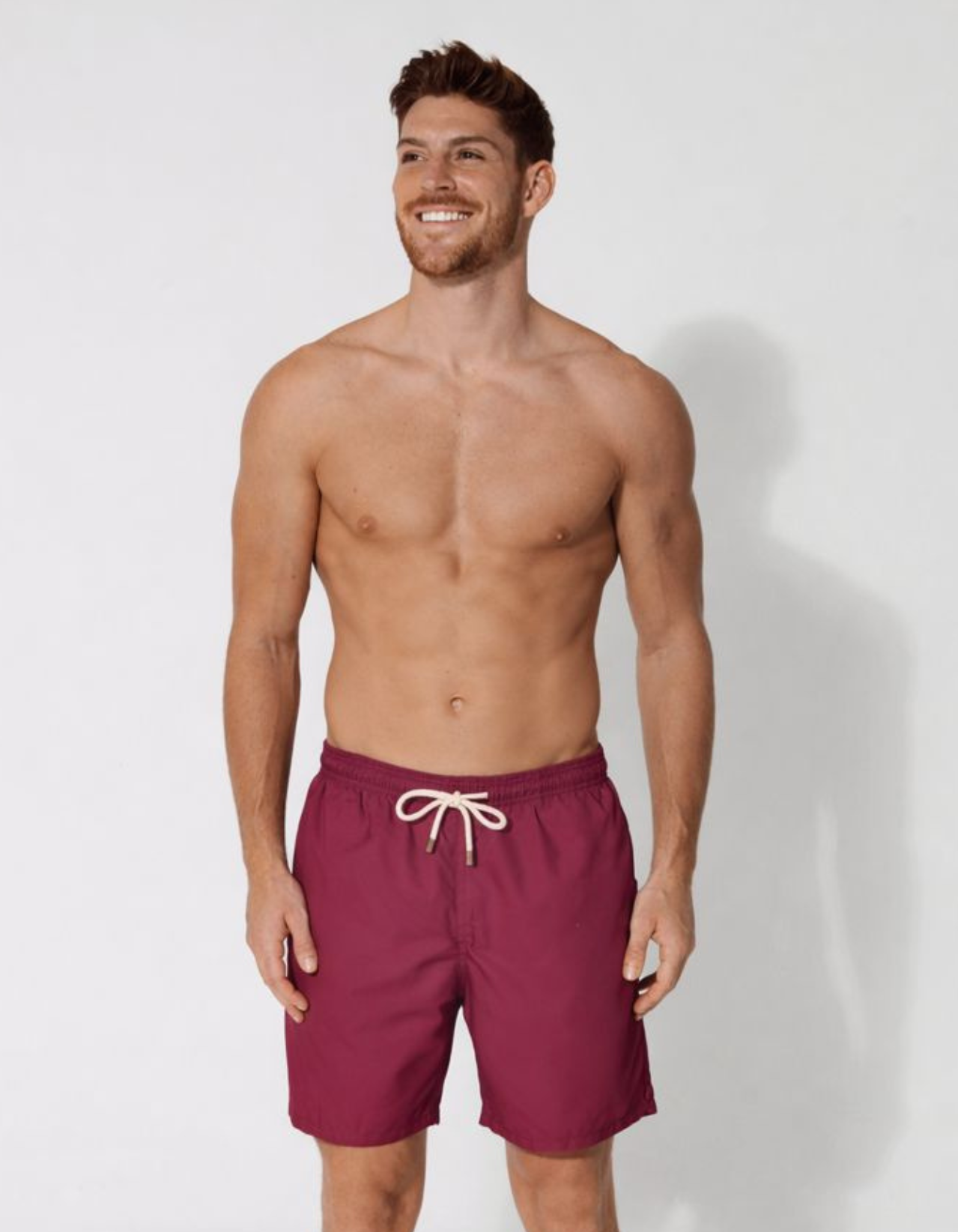Plum Mens Swim Shorts, front view. Sustainable mens swimwear.