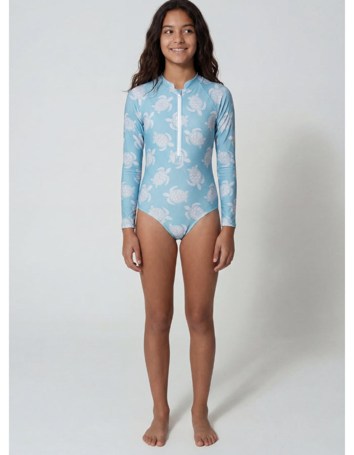 Eve wearing Maldives Blue Turtle Long Sleeved Girls Swimsuit, size Age 12