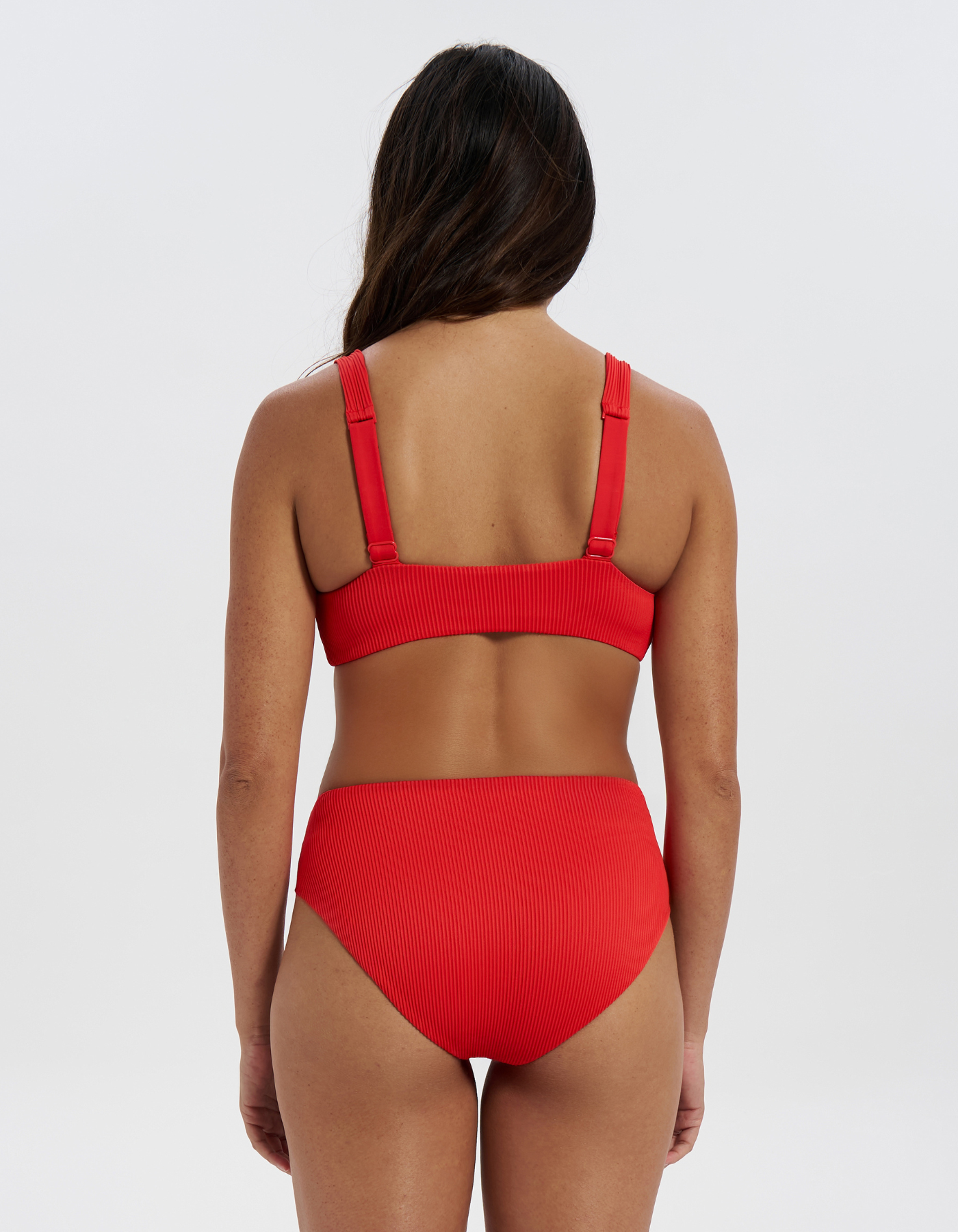 Mid Waist Lipstick Red Womens Ribbed Bikini Bottoms, back view. Sustainable womens swimwear.