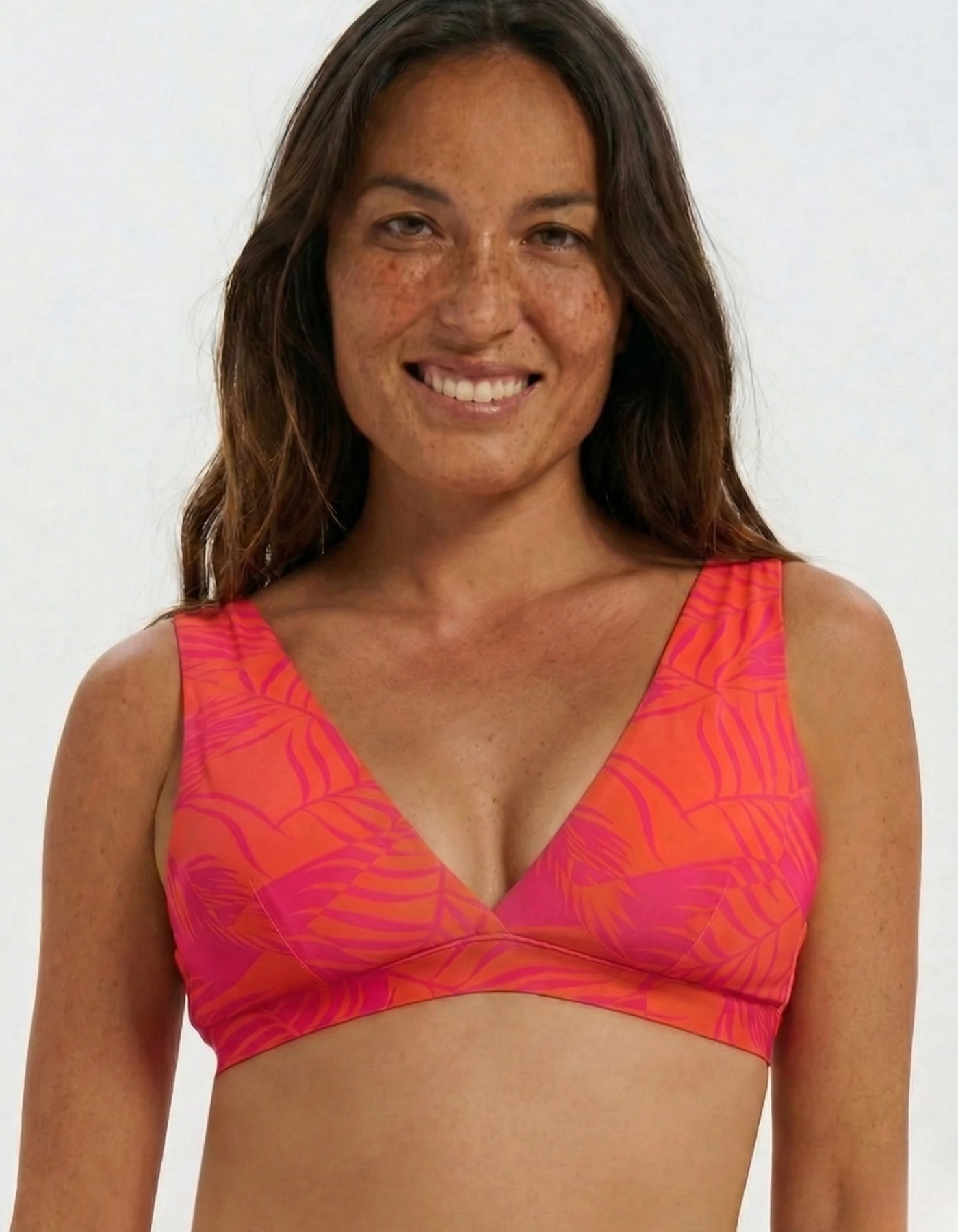 Dune – Aperol Palm Womens Plunge Bikini Top, front view. Sustainable womens swimwear.