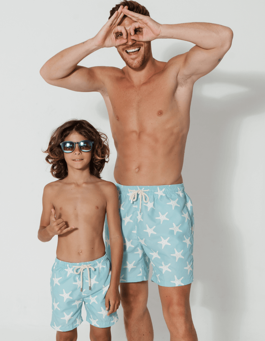 Father & Son Swim Shorts Blue Starfish, front view. Father and son matching swim shorts.