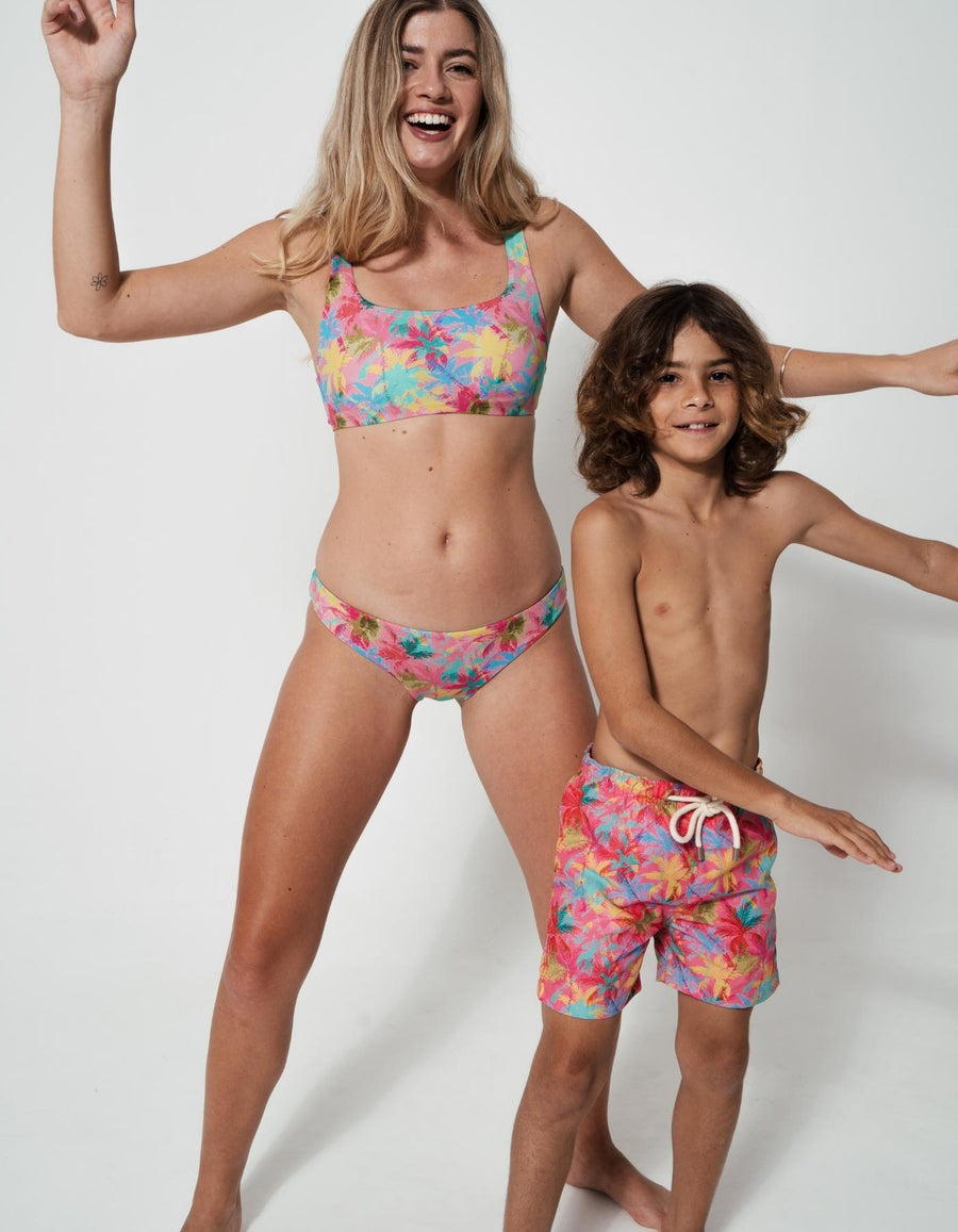 Mother & Son Pink Palm, front view. Mother and son matching swimwear.
