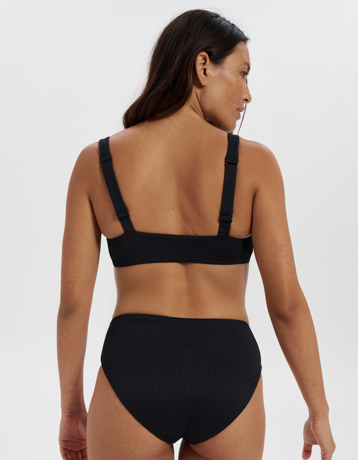 Nikoi Black Womens Ribbed Tank Bikini Top, print detail. Sustainable womens swimwear.