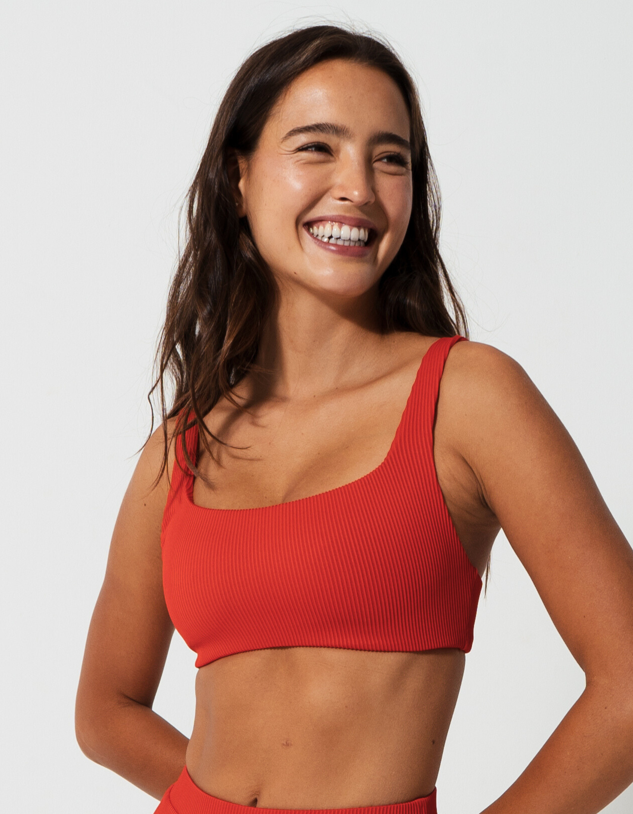 Nikoi Lipstick Red Womens Ribbed Tank Bikini Top, front view. Sustainable womens swimwear.