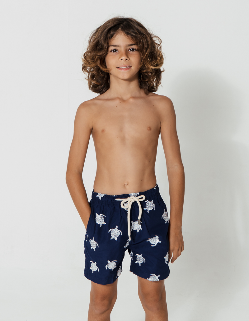Tom wearing Embroidered Turtle Boys Swim Shorts, size Age 8