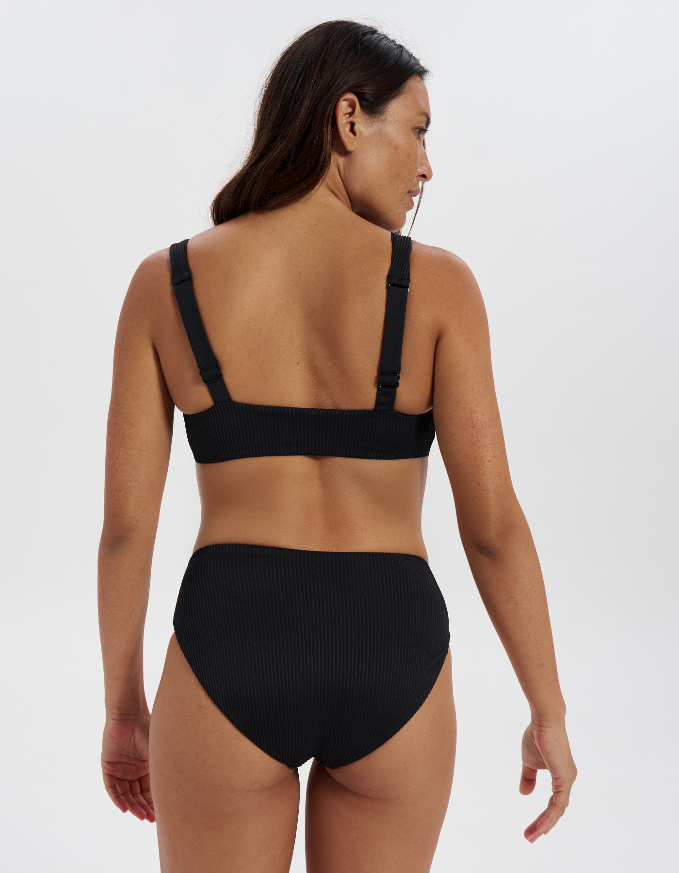Mid Waist Black Womens Ribbed Bikini Bottoms, print detail. Sustainable womens swimwear.