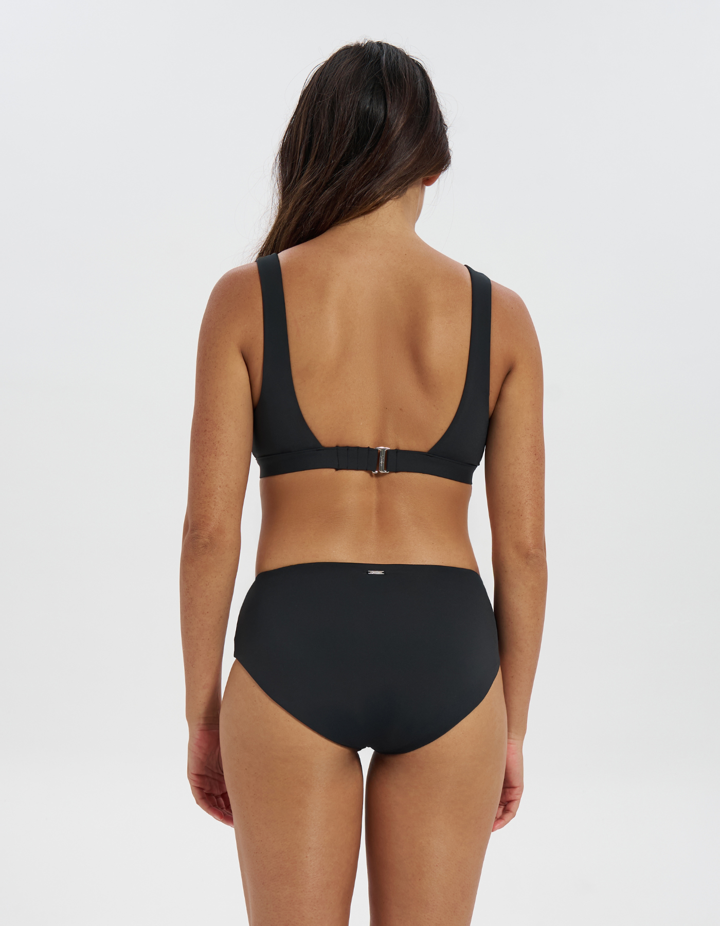 Mid Waist Black Womens Bikini Bottoms, back view. Sustainable womens swimwear.
