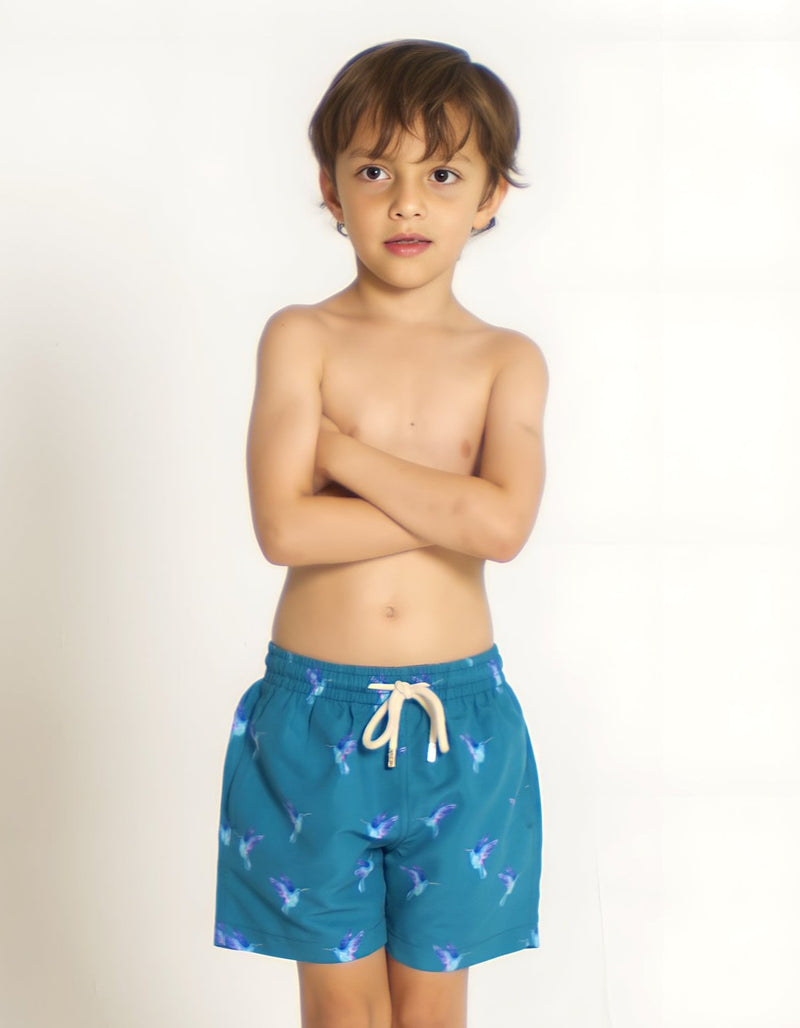 Finn wearing Hummingbird Boys Swim Shorts, size Age 6