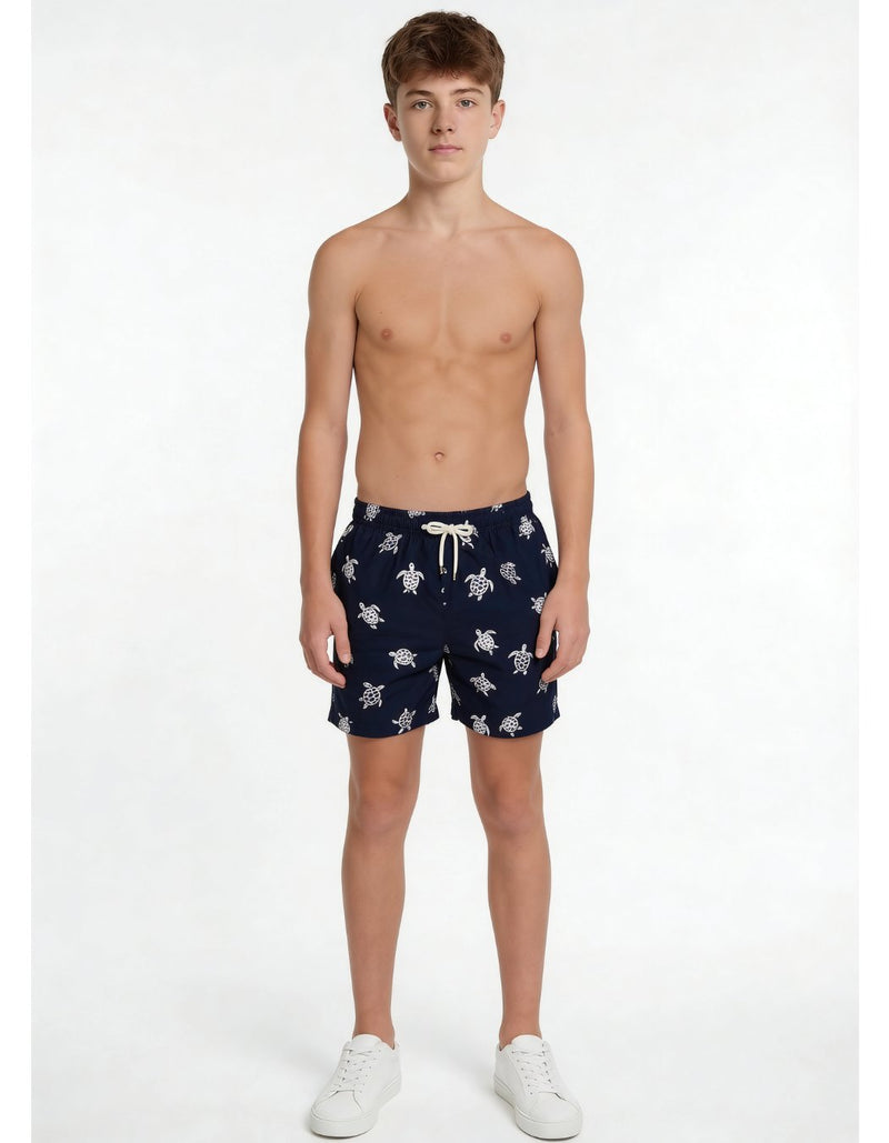 Sam wearing Embroidered Turtle Boys Swim Shorts, size Age 12