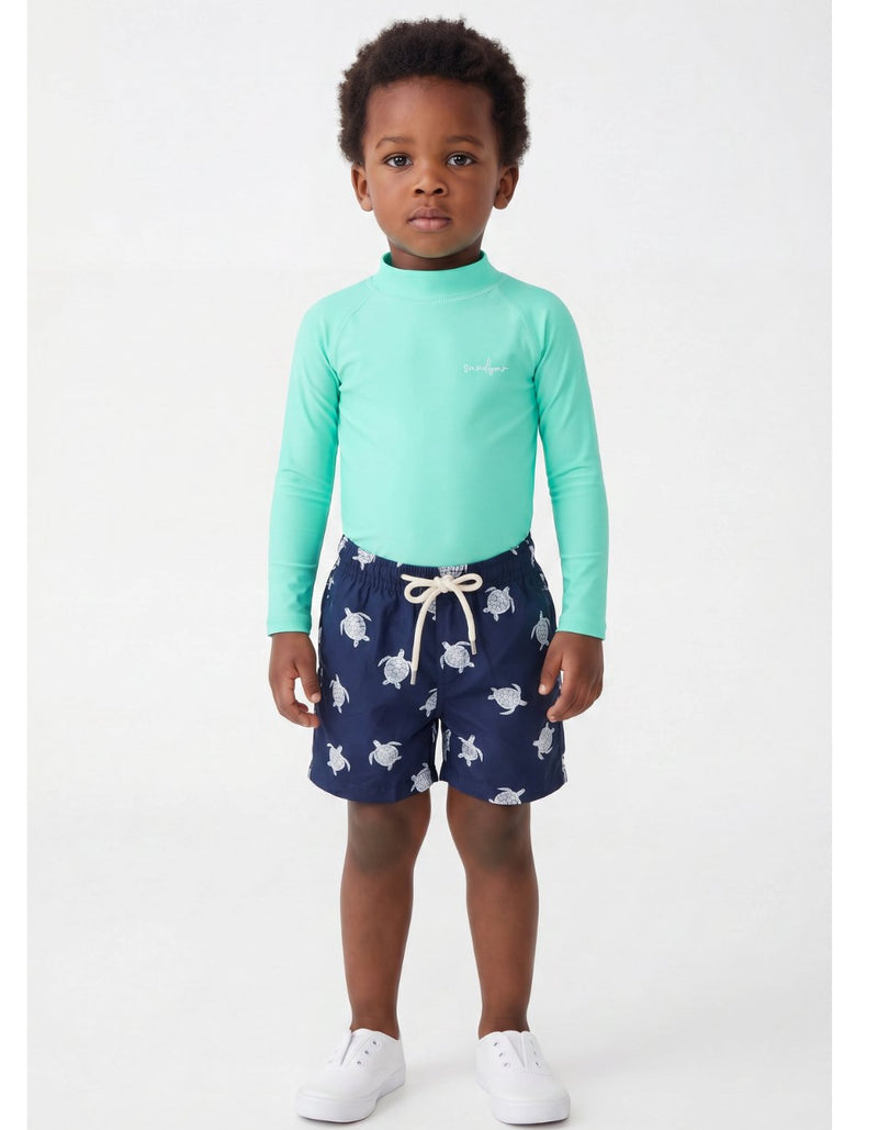 Oscar wearing Embroidered Turtle Boys Swim Shorts, size Age 3