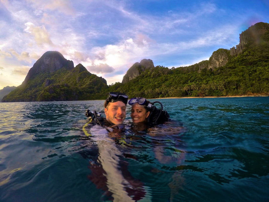 Sandbar founders Mel and Tom diving among limestone islands in Southeast Asia