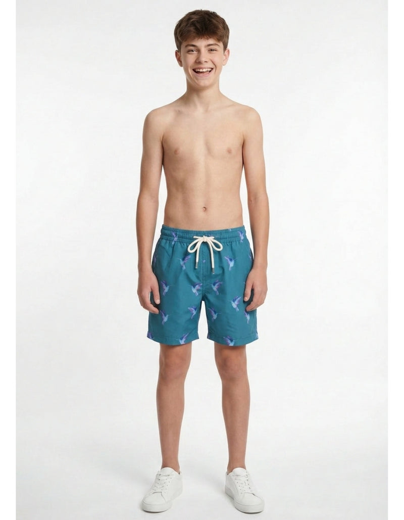 Sam wearing Hummingbird Boys Swim Shorts, size Age 13