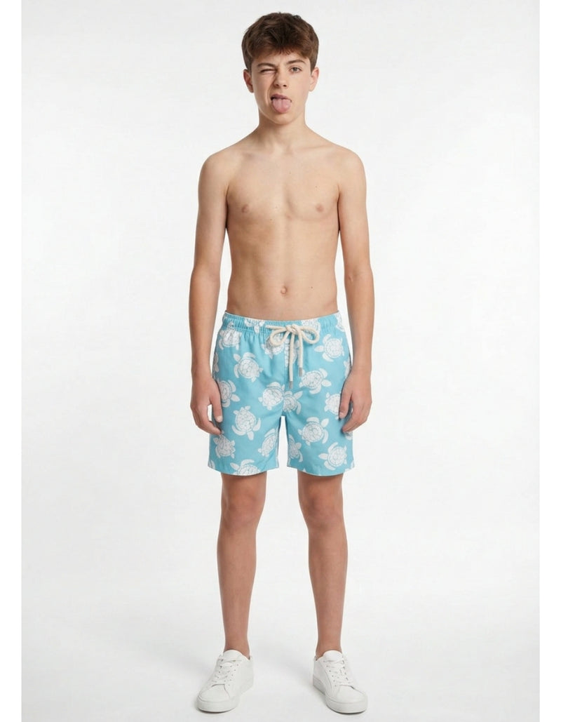 Sam wearing Maldives Blue Turtle Boys Swim Shorts, size Age 13