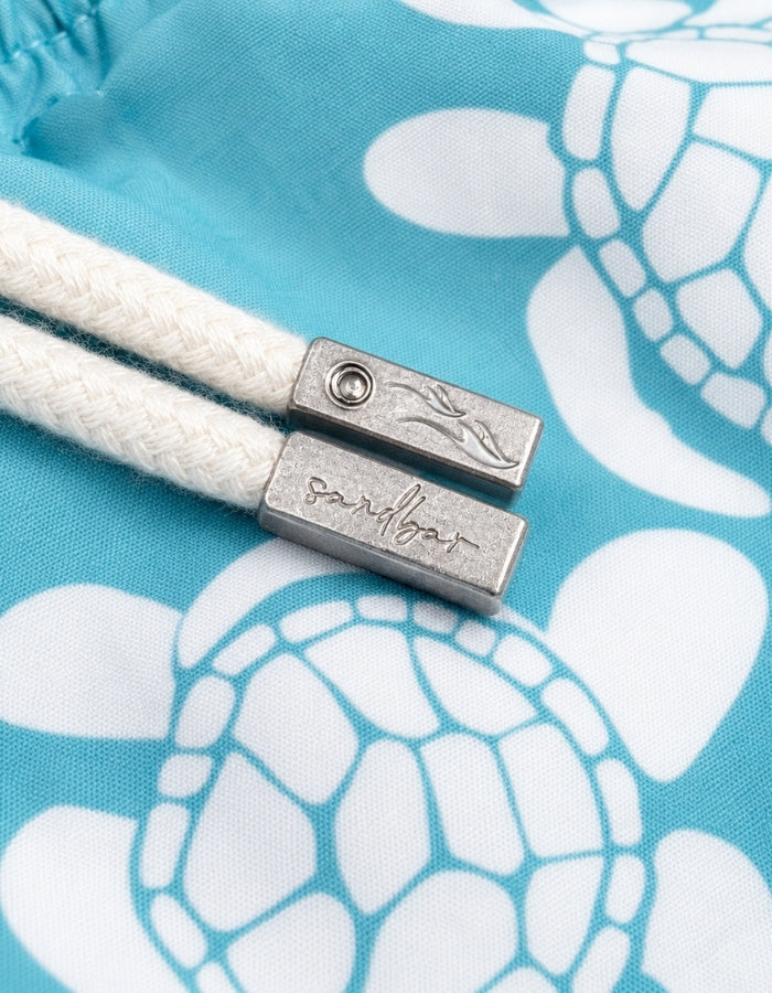 Sandbar Sustainable Swim Shorts metal string end caps