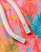 Pink Palm Boys Swim Shorts, metal string end caps. Sustainable boys swimwear.