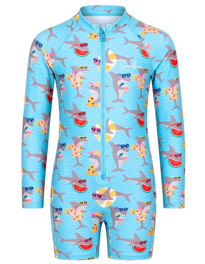 A kids' long-sleeve full-zip swimsuit in light blue, featuring an all-over cartoon print of gray sharks wearing sunglasses, eating watermelon slices, and pizza slices. The brand name 'Sunnyde' is printed in white script on the upper chest.