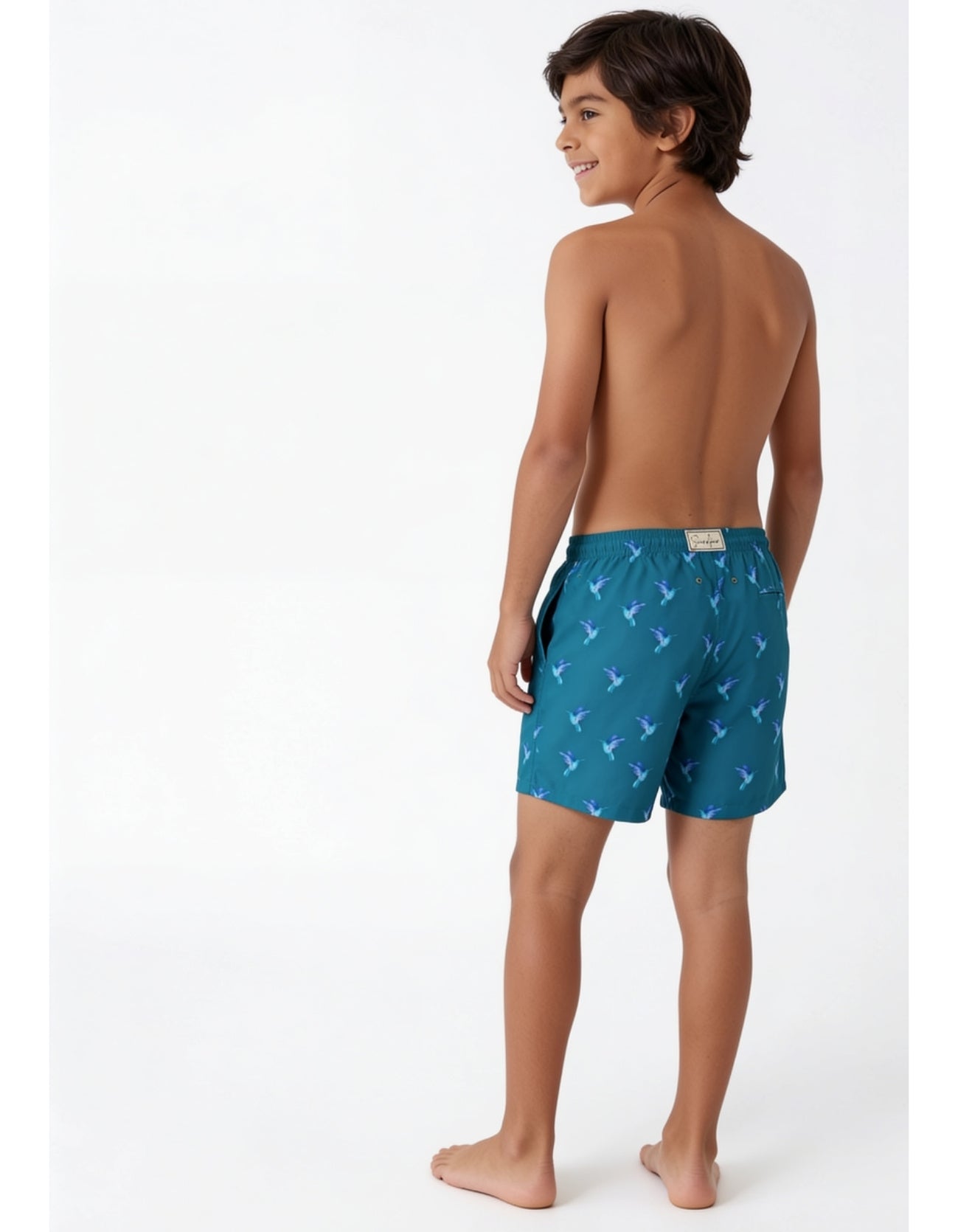kids hummingbird sustainable swim shorts for all ages teal colour back view
