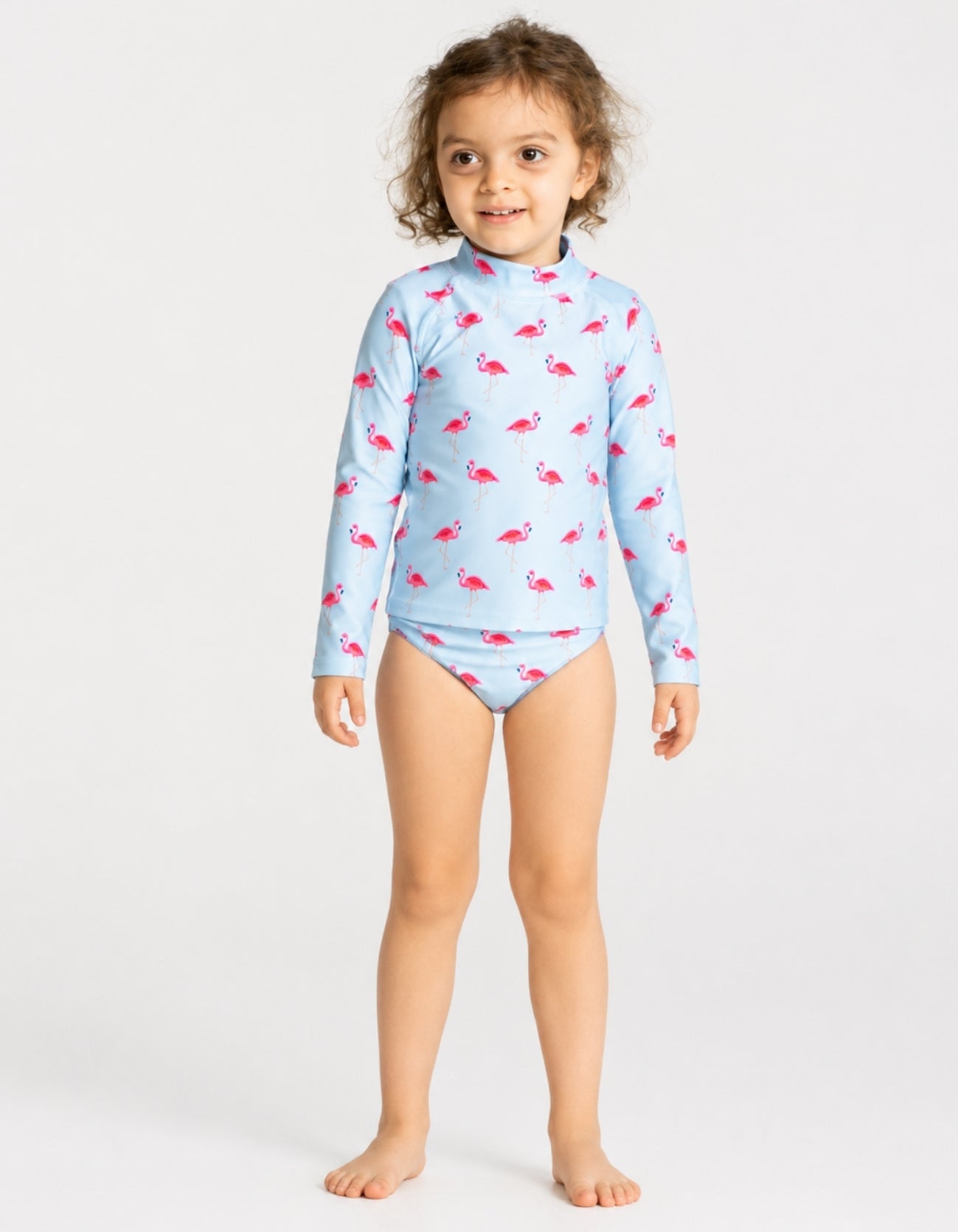 Pink Flamingo print rash guard set with matching bikini bottoms, long sleeve kids UPF swimwear front view