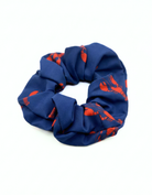 Red Lobster Scrunchie, front view. Recycled hair scrunchie.
