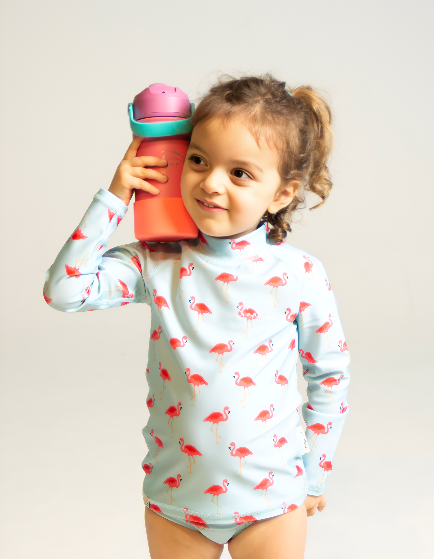 Flamingo Rash Guard, front view. Kids UPF50 rash guard.