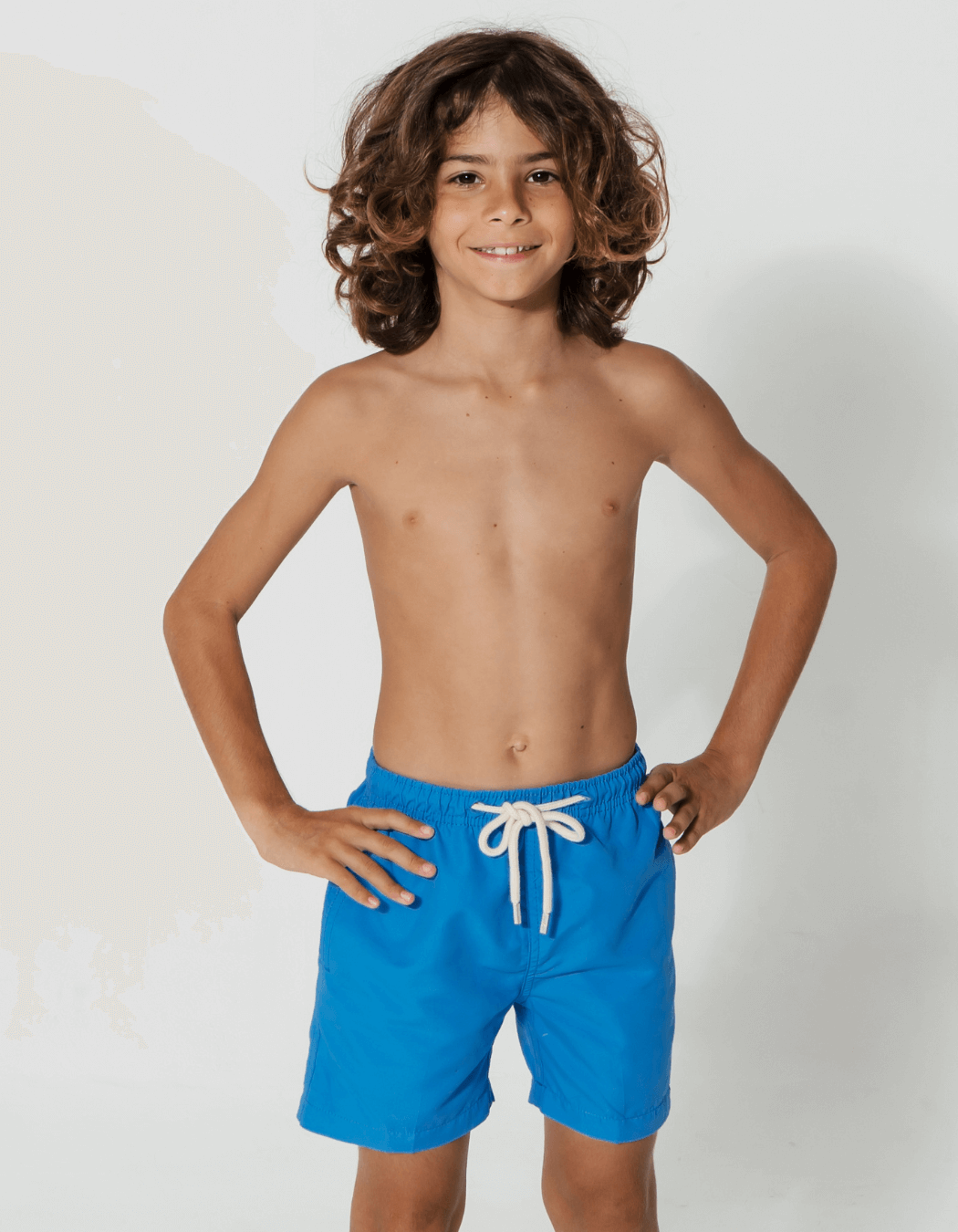Coastal Blue Boys Swim Shorts, front view. Sustainable boys swimwear.